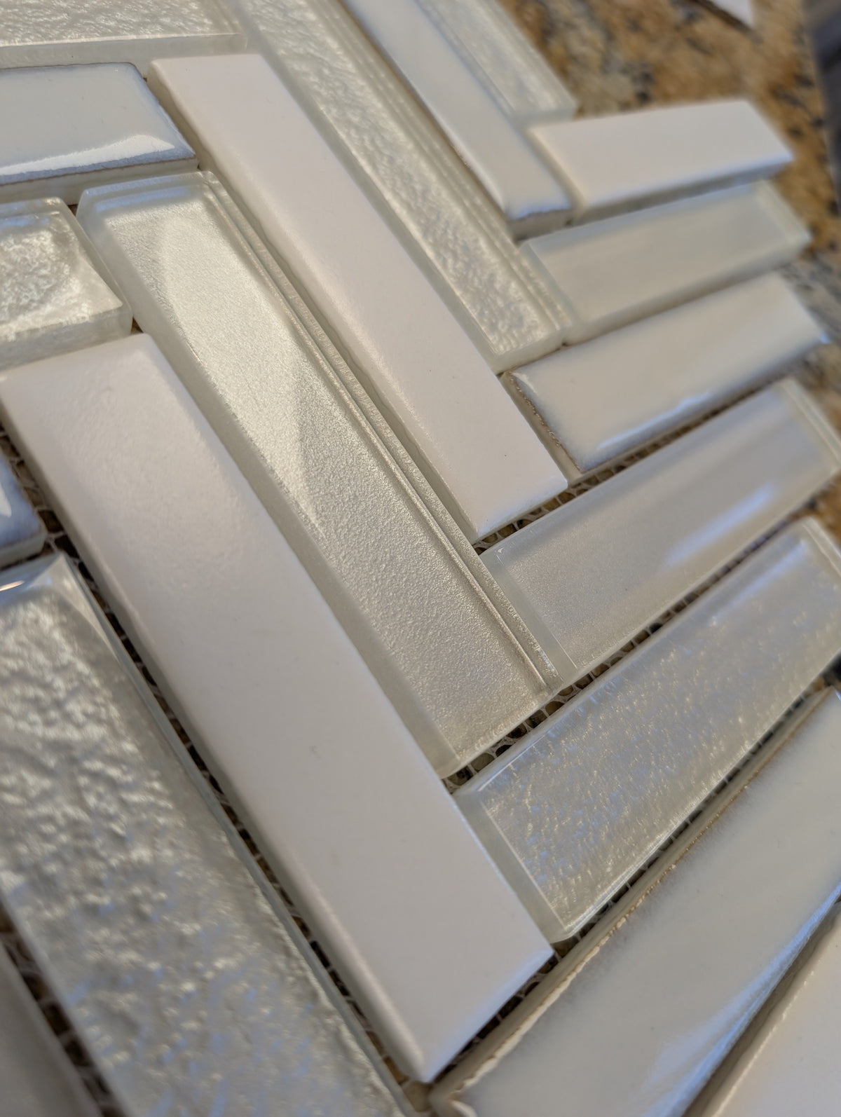 Intermatex Whites herringbone mosaic closeout