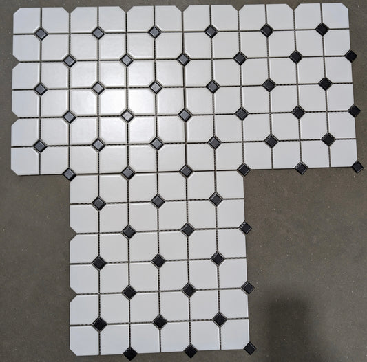 White Elongated Octagon With Black Dot